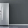 A refrigerator with fridge puns and jokes written on the side