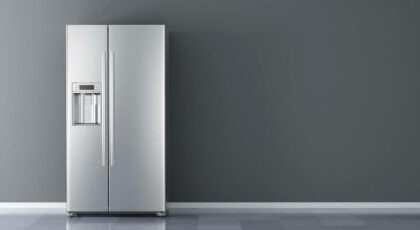 A refrigerator with fridge puns and jokes written on the side