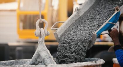 Concrete being poured while workers tell puns and jokes