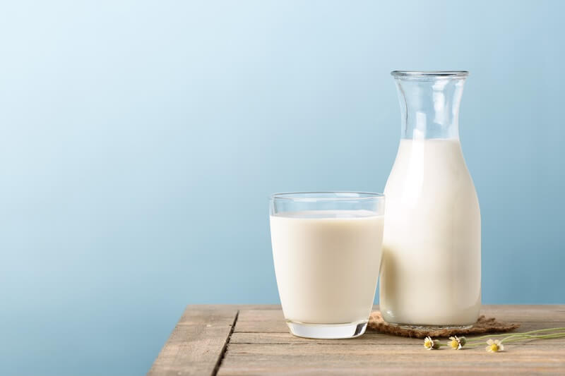 Milk on a table where people are telling puns and jokes