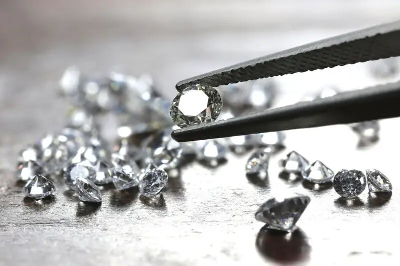 Diamonds being inspected while coming up with puns about them