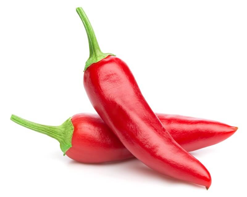 Two peppers on a white background